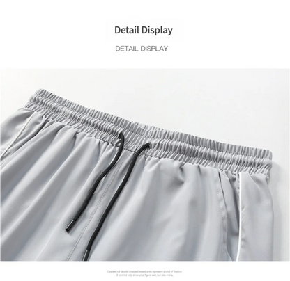 Summer ice silk thin section pants men's Hong Kong style loose splicing casual sports wide-legged pants elastic speed pants