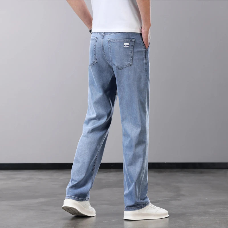 Summer Thin Men's Jeans Lyocell Fabric Soft Breathable Straight Denim Pants Brand Man Elastic Ice Silk Casual Trousers Grey Blue.