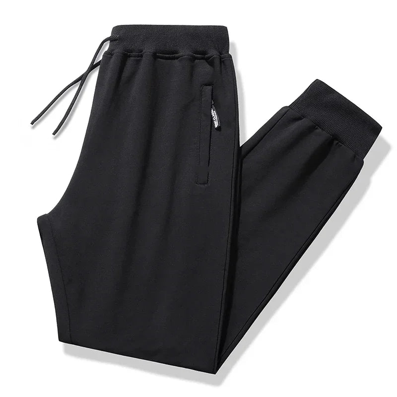 Men's Casual Pants Plus Size 110-180KG Stretch Slim Fit Elastic Waist Jogger Pants 1XL-7XL Classic Black Trousers Male Clothing.