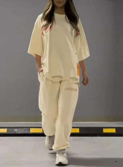 Summer New Fashion Hollowed Out O Neck T Shirt Women's 2 Piece Set Solid Color Casual Relaxed Tracksuit Pants Pocket Female Suit.