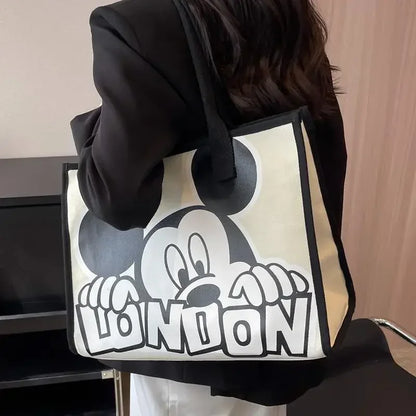 New Disney  Mickey Canvas Bag Women's Versatile Casual Shoulder Bag Commuter Handbag Large Capacity Multifunctional Mommy Bag.