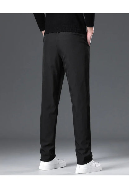 New Winter Men's Down Pants High Quality Thick Warm Goose Down Padded Business Casual Pants for Male Fashion Trousers Outerwear.