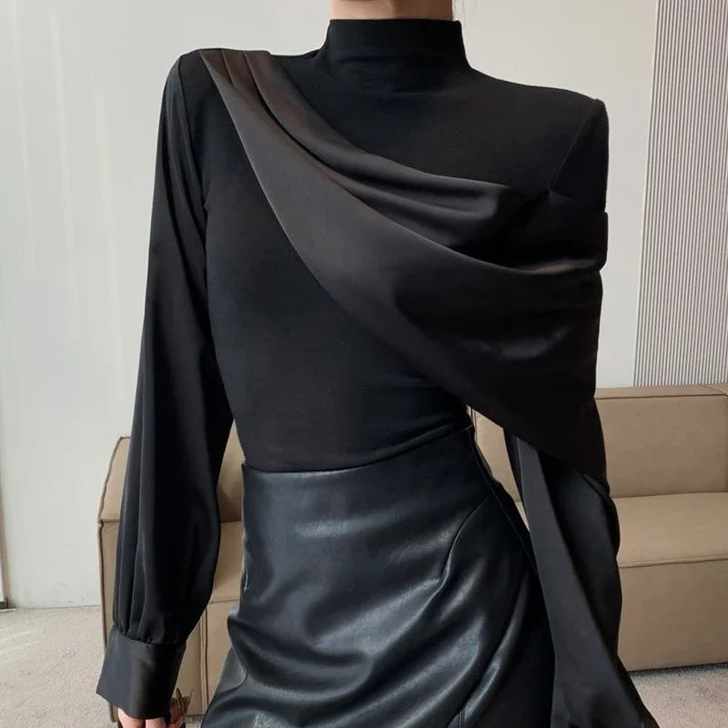 Long-sleeved shirt women's 2024 spring and autumn new light luxury fashion splicing design sense niche temperament versatile top.