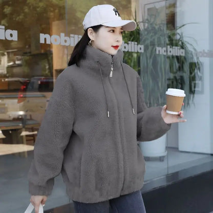 Frauen Winter Doppel Korallen Fleece Warme Mantel Stehkragen Plüsch Dicken Mantel Weibliche Mode Casual Langarm Zipper Kleidung.