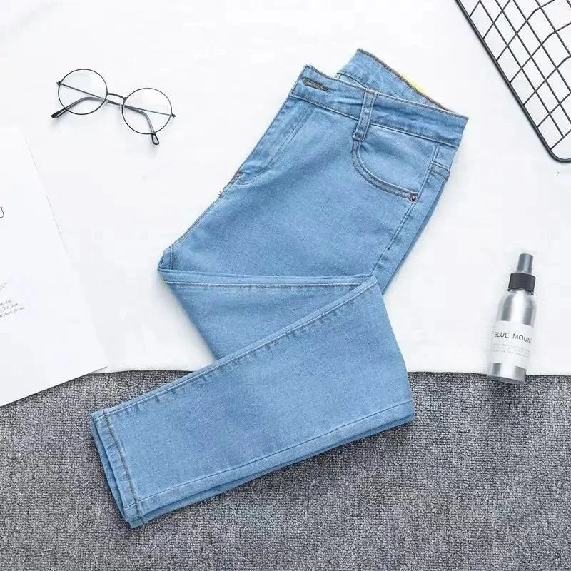 High Waist plus Size Denim Jeans Women's Fitting Pencil Pants Elastic Casual Long Trousers Light Blue Spring Autumn Wear.
