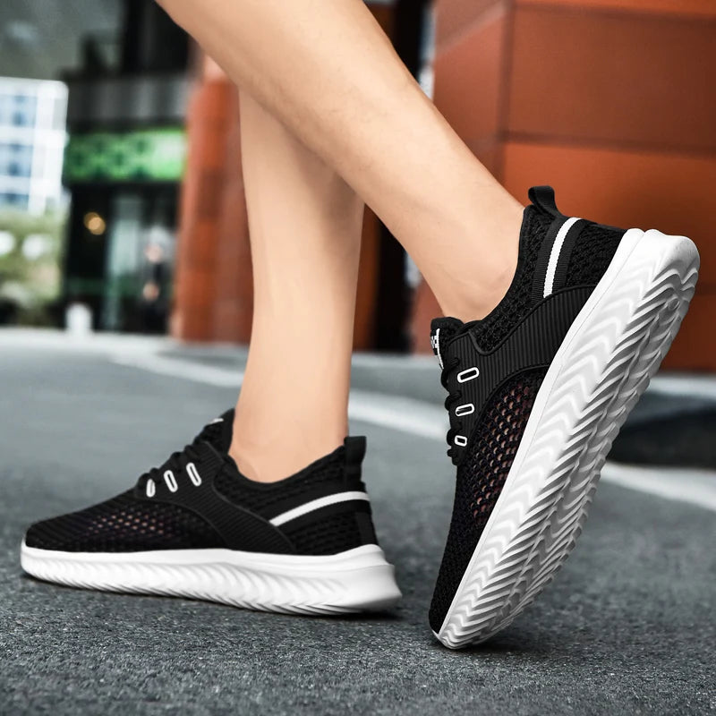 Sommer Herren Sneakers atmungsaktive und leichte Herren Casual Tennis Sneakers Hollow Mesh Herren Laufschuhe Tenis Masculino.