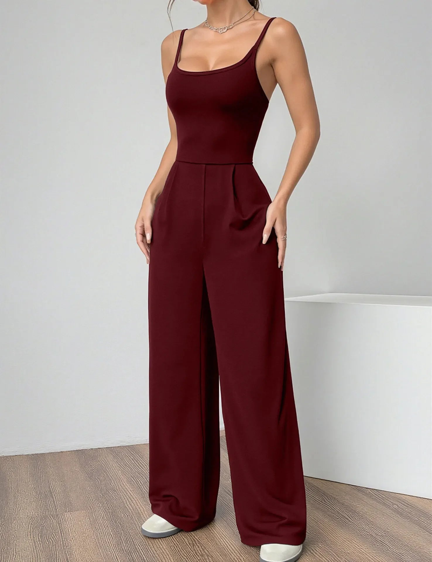 Fashionable Solid Color High Waist Bell Bottom Jumpsuit Backless Strap Casual Women's Long Pants One Piece Suit Female.