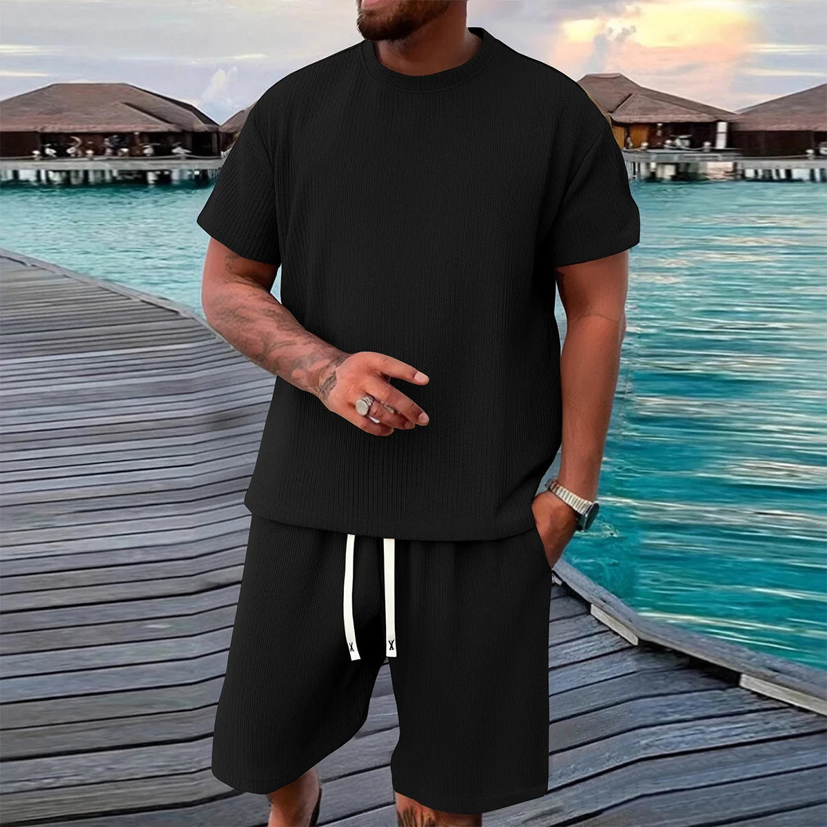 2-piece men's short sleeved shorts set, made of jacquard fabric suitable for fitness, running, and outdoor leisure activities.