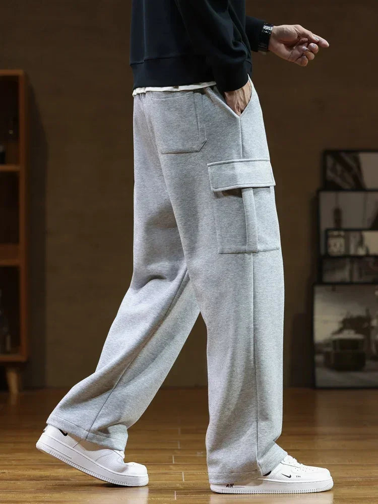 Männer Casual Hosen Neue Jogginghose Männer Multi-Taschen Kordelzug Baumwolle Beiläufige Breite Hosen Männliche Lose Gerade Hosen Größe 8XL.