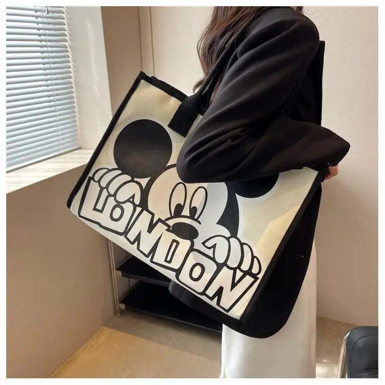 New Disney  Mickey Canvas Bag Women's Versatile Casual Shoulder Bag Commuter Handbag Large Capacity Multifunctional Mommy Bag.