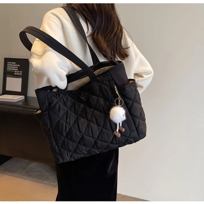 Black Large Capacity Handbag with Square Pattern, Durable Quilted Material, Multiple Pockets for Easy Storage & Cute Plush Charm.