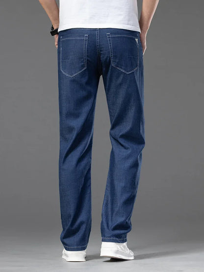 Summer Ultra Thin Men's Loose Jeans Lyocell Ice Silk Fashion Casual Business Denim Pants Straight Stretch Male Trousers.