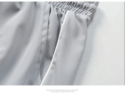 Summer ice silk thin section pants men's Hong Kong style loose splicing casual sports wide-legged pants elastic speed pants