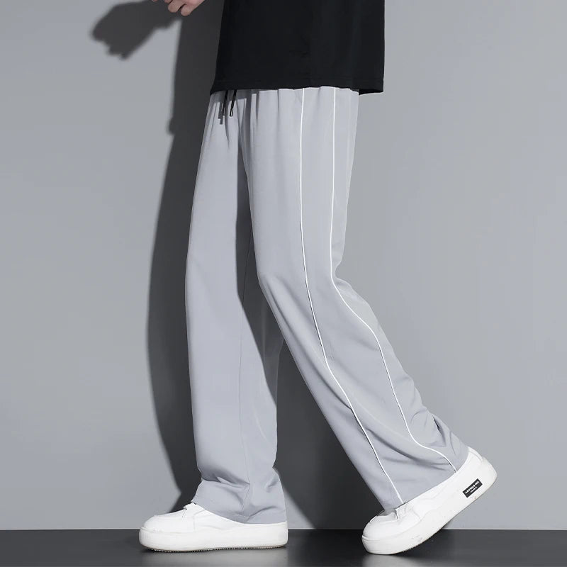 Summer ice silk thin section pants men's Hong Kong style loose splicing casual sports wide-legged pants elastic speed pants