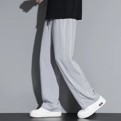 Summer ice silk thin section pants men's Hong Kong style loose splicing casual sports wide-legged pants elastic speed pants