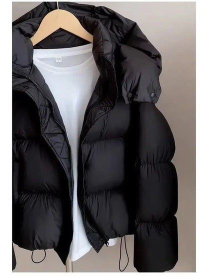2023 neue Winter Puffer Jacke Frauen Mode Mit Kapuze Unten Baumwolle Mantel Weibliche Lose Beiläufige Warme Parkas Oberbekleidung.