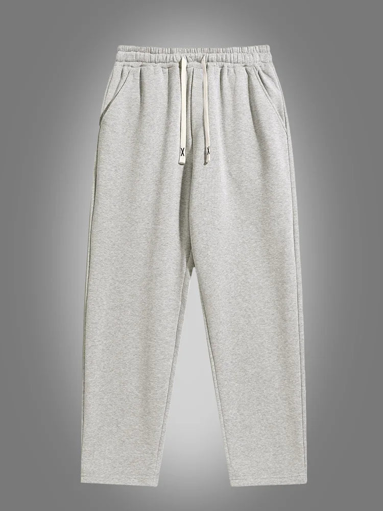 Men's solid color straight leg jogging pants, suitable for casual sports such as running, gym, and outdoor activities.