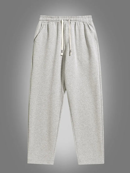 Men's solid color straight leg jogging pants, suitable for casual sports such as running, gym, and outdoor activities.