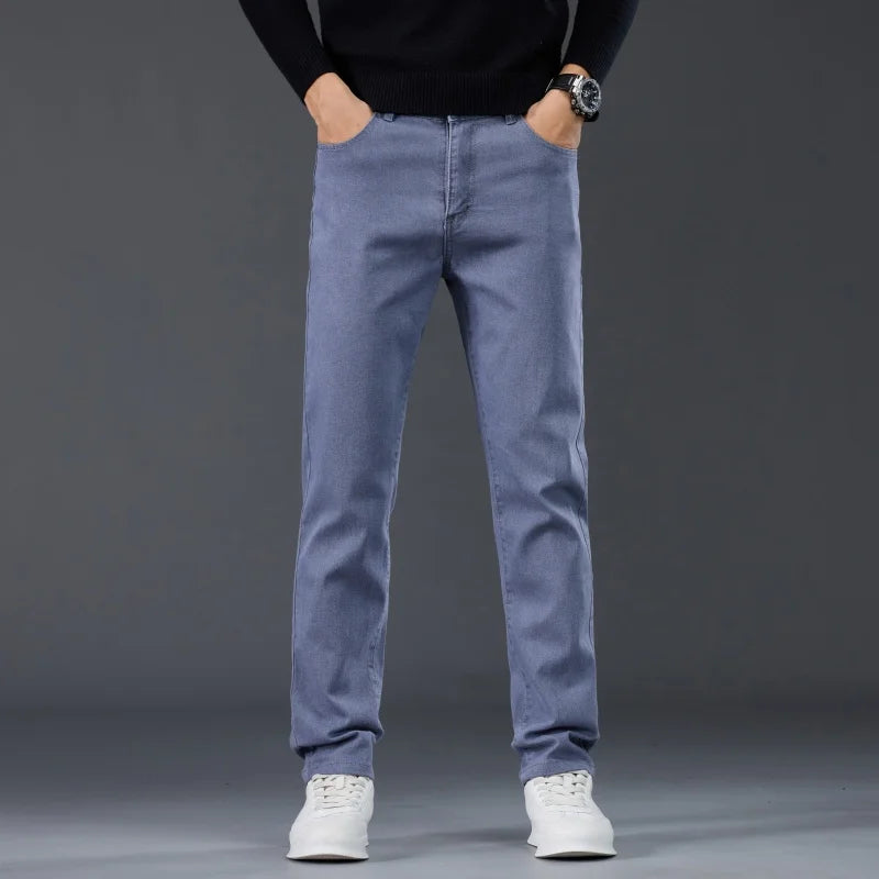 Male Brand Jeans Clothing Light Luxury Stretch Looes Fit Pants Comfortable Soft Business Fashion Straight Casual Denim Trousers.