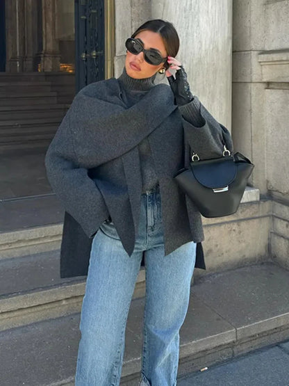 ZBZA Women's Asymmetric Scarf Knitted Jacket O-neck Single Button Side Slit Solid Loose Coat Winter New Female Chic Outerwear.