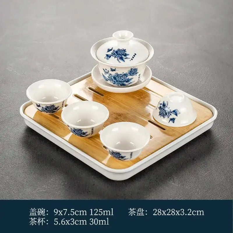 1 gaiwan 4 cups 1 teaboad Ceramic kungfu tea set household  one cover bowl four cups living room kungfu office reception.