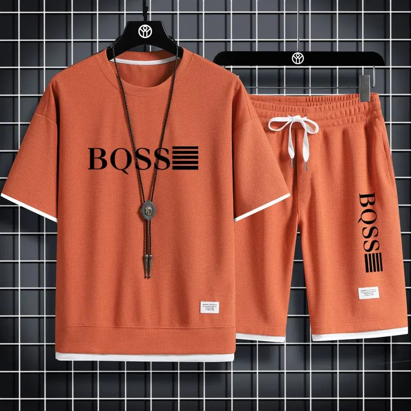 Summer fitness jogging loose sportwear set men's solid color short-sleeved casual T-shirt + shorts breathable two-piece set.