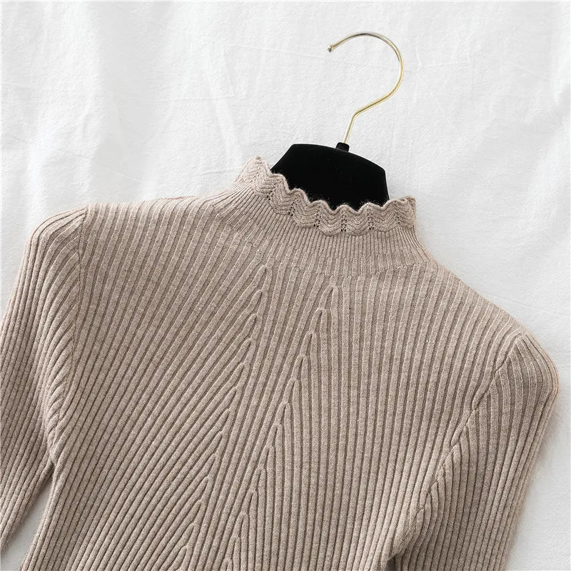 2026 weibliche Dünne Koreanische Strickwaren Tops Herbst Winter Pullover Frauen Hohl-out Pullover Langarm Rollkragenpullover.