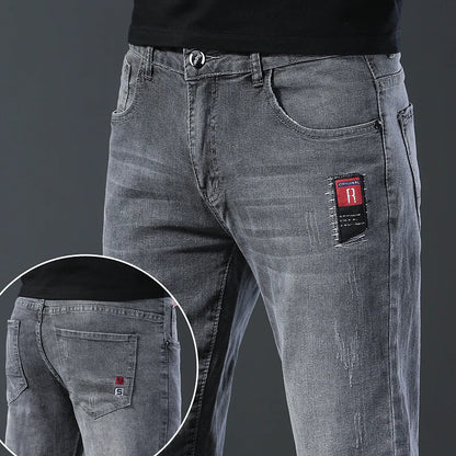 Men's slim fit Korean style comfortable straight leg elastic gray mid waist pants men's casual business jeans.