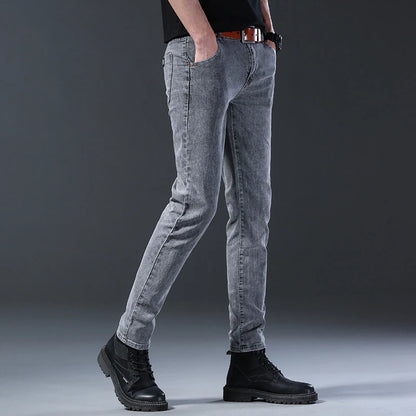 New style jeans, men's slim fit, Korean style comfortable straight leg elastic gray mid waist pants, men's casual denim pants.