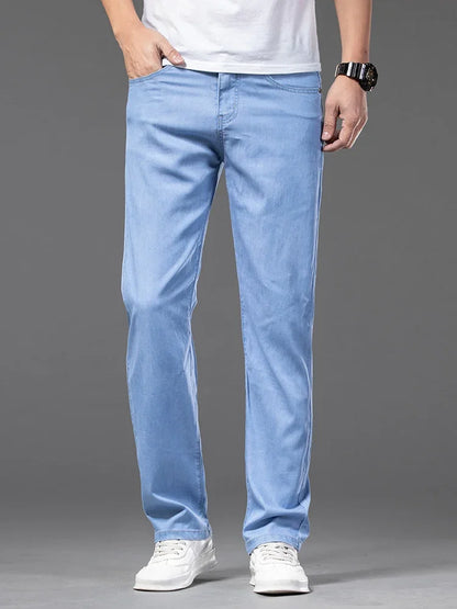 Summer Ultra Thin Men's Loose Jeans Lyocell Ice Silk Fashion Casual Business Denim Pants Straight Stretch Male Trousers.