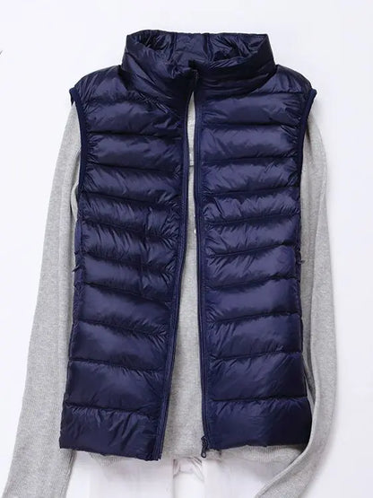 0-10 ℃   Frauen Westen Herbst Winter Ultra Licht Ente Unten Weste Weibliche Dünne Ärmellose Jacke Winddicht Warme Puffer Weste 4XL.