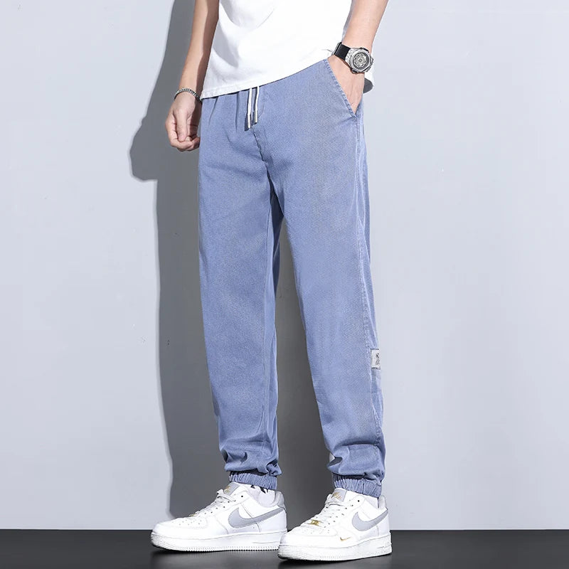 Men's Lyocell Loose Cuffed Tapered Pants 2025 Summer Autumn Comfortable Breathable Casual Long Pants Plus Size 5XL.