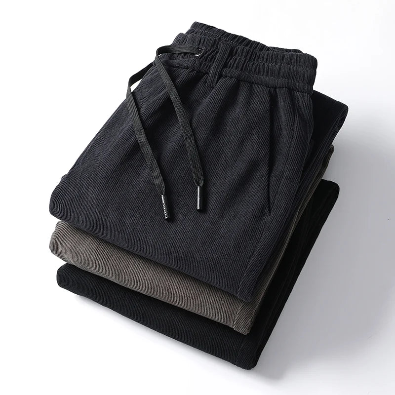 Elastic Waist Casual Pants Men Joggers Loose Fit Straight Pants Spring Autumn Male Trousers Large Size Black Grey.