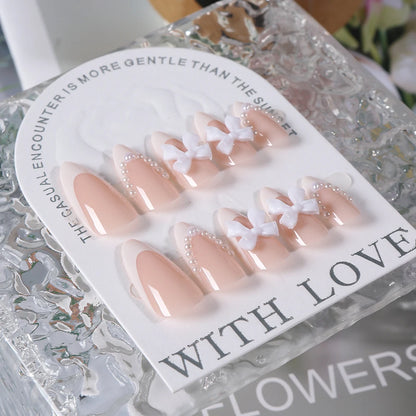 24pcs(+Tools) Pearl Bow Nude Pink Press On Nails White French Fingertips Almond Full Cover Fasle Nails New Year Nail Accessories.