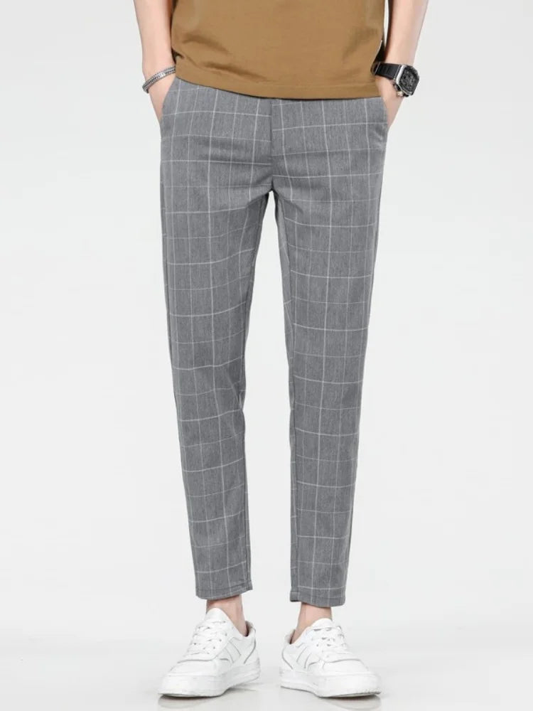 Neue karierte Mode Europa und die Vereinigten Staaten Stil Herrenhosen Business Casual Travel Slim Hosen bequem und vielseitig.