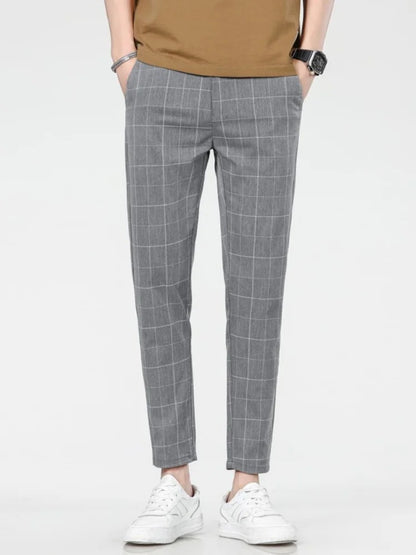 Neue karierte Mode Europa und die Vereinigten Staaten Stil Herrenhosen Business Casual Travel Slim Hosen bequem und vielseitig.