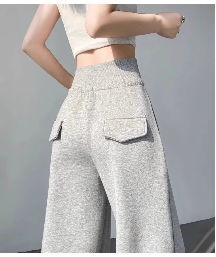 Graue Sporthose für Damen mit hoher Taille und lockerem, schlankem, geradem Bein und weitem Bein. Amerikanische Jogginghose..