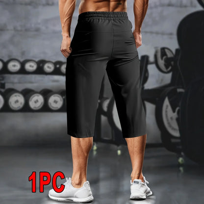 1pc Men's Lightweight Athletic Cropped Pants with Drawstring, Zippered Pockets & Reflective Strips - Breathable, Quick-Dry Fabri.