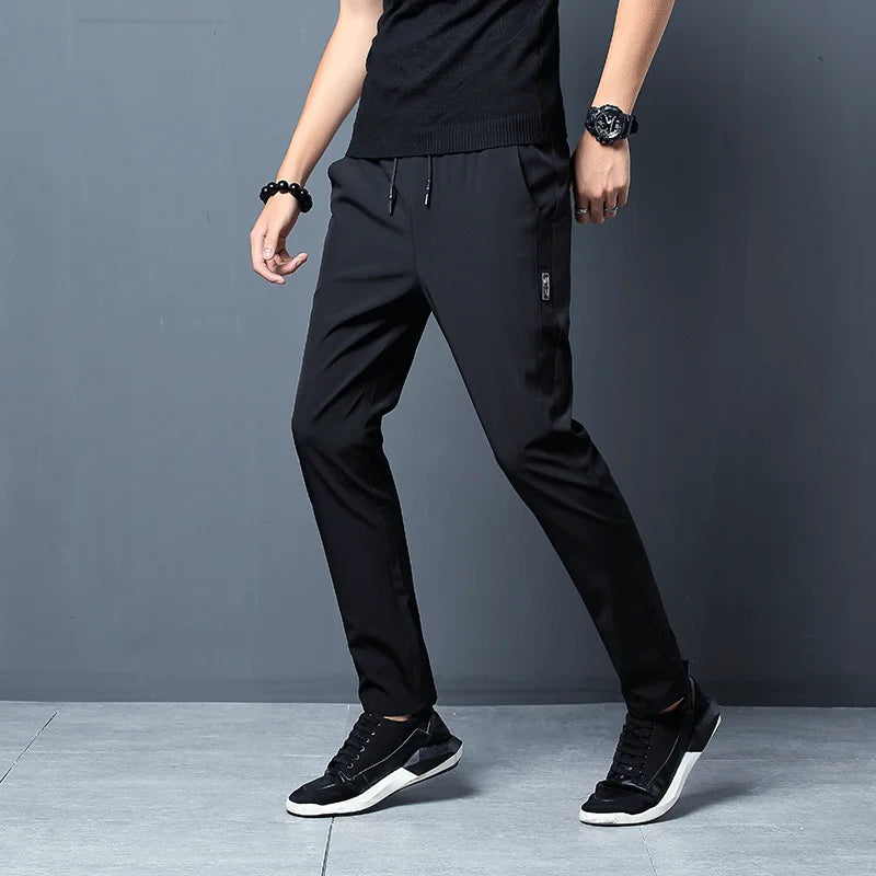 Men's Casual Pants Stretch Slim Fit Elastic Waist Jogger Korean Classic Blue Black Gray Male Brand Trousers Plus Size 4XL 5XL.