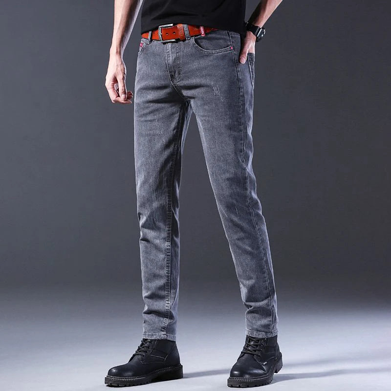 Men New Fashion Comfortable Slim Fit Jeans Male Loose Straight Smart Casual Denim Pants Formal Elasticity Look Taller Trousers.