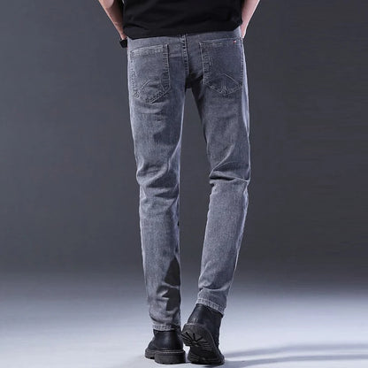 Men New Fashion Comfortable Slim Fit Jeans Male Loose Straight Smart Casual Denim Pants Formal Elasticity Look Taller Trousers.