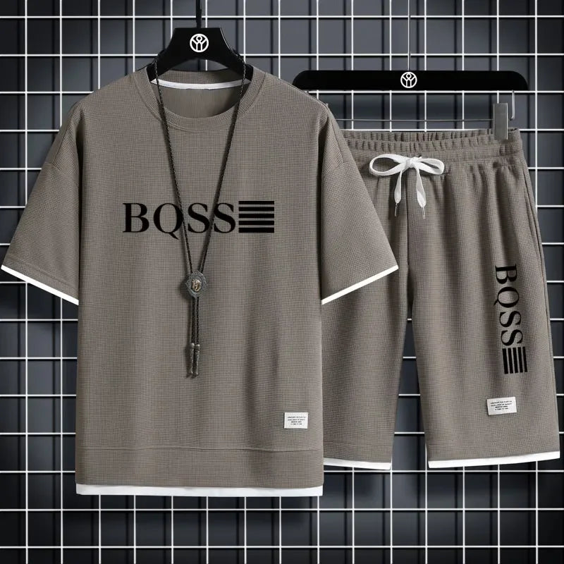 Summer fitness jogging loose sportwear set men's solid color short-sleeved casual T-shirt + shorts breathable two-piece set.