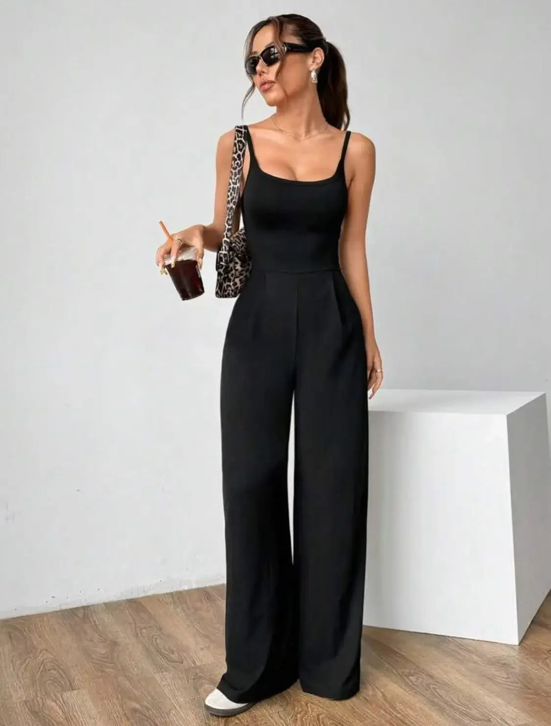 Fashionable Solid Color High Waist Bell Bottom Jumpsuit Backless Strap Casual Women's Long Pants One Piece Suit Female.