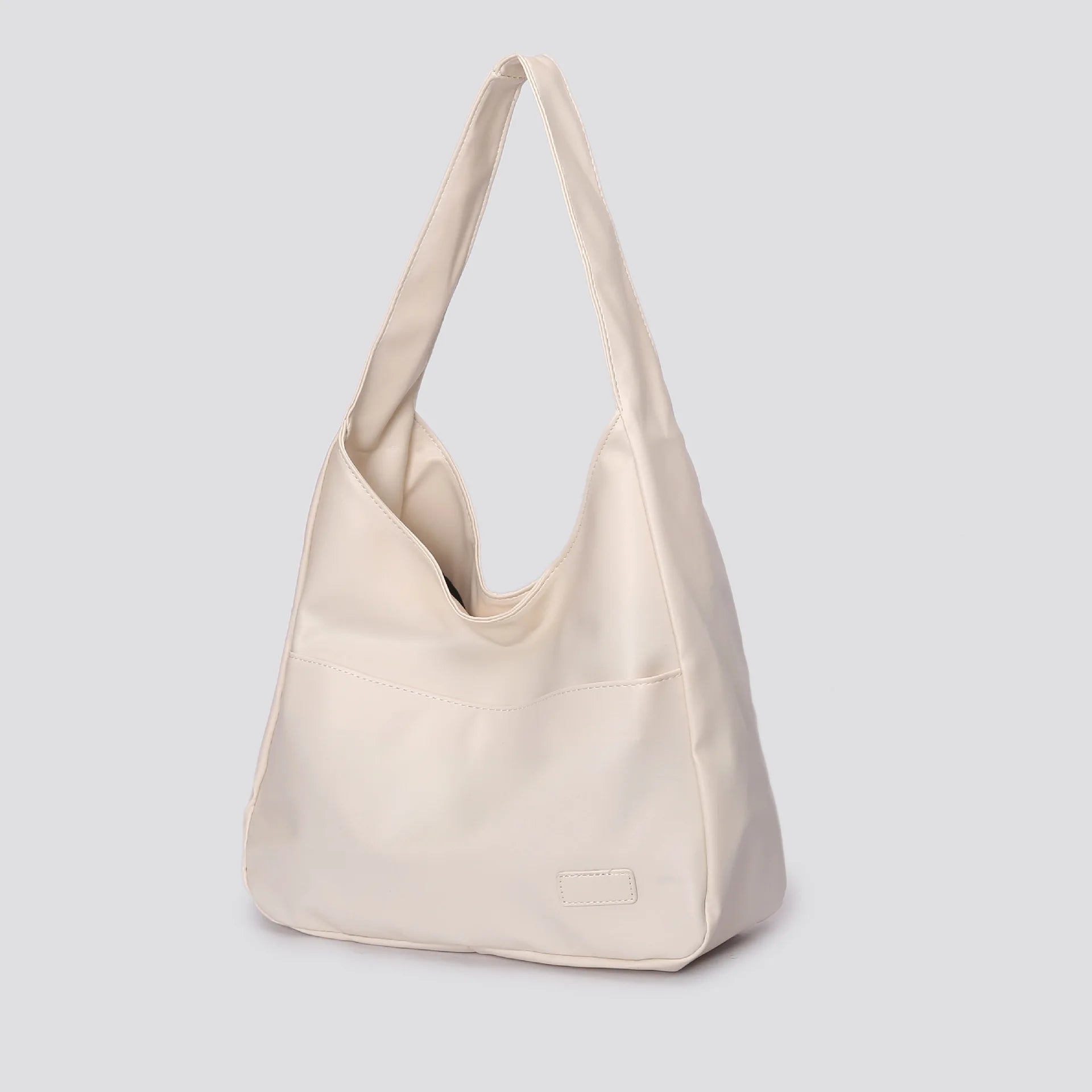 Large capacity tote bag, new black leather simple casual commuting women's bag, fashionable and versatile single shoulder bag.