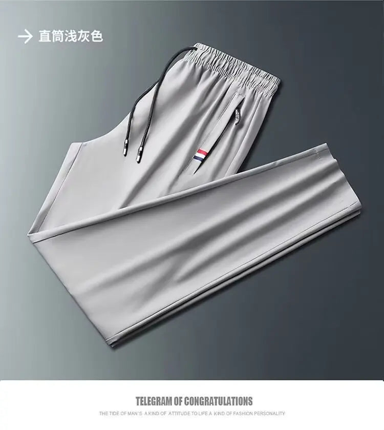 Men's Quick Dry Loose Fit Breathable Summer Lightweight Casual Pants Korean Style Elastic Sweatpants For Men.