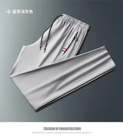 Men's Quick Dry Loose Fit Breathable Summer Lightweight Casual Pants Korean Style Elastic Sweatpants For Men.