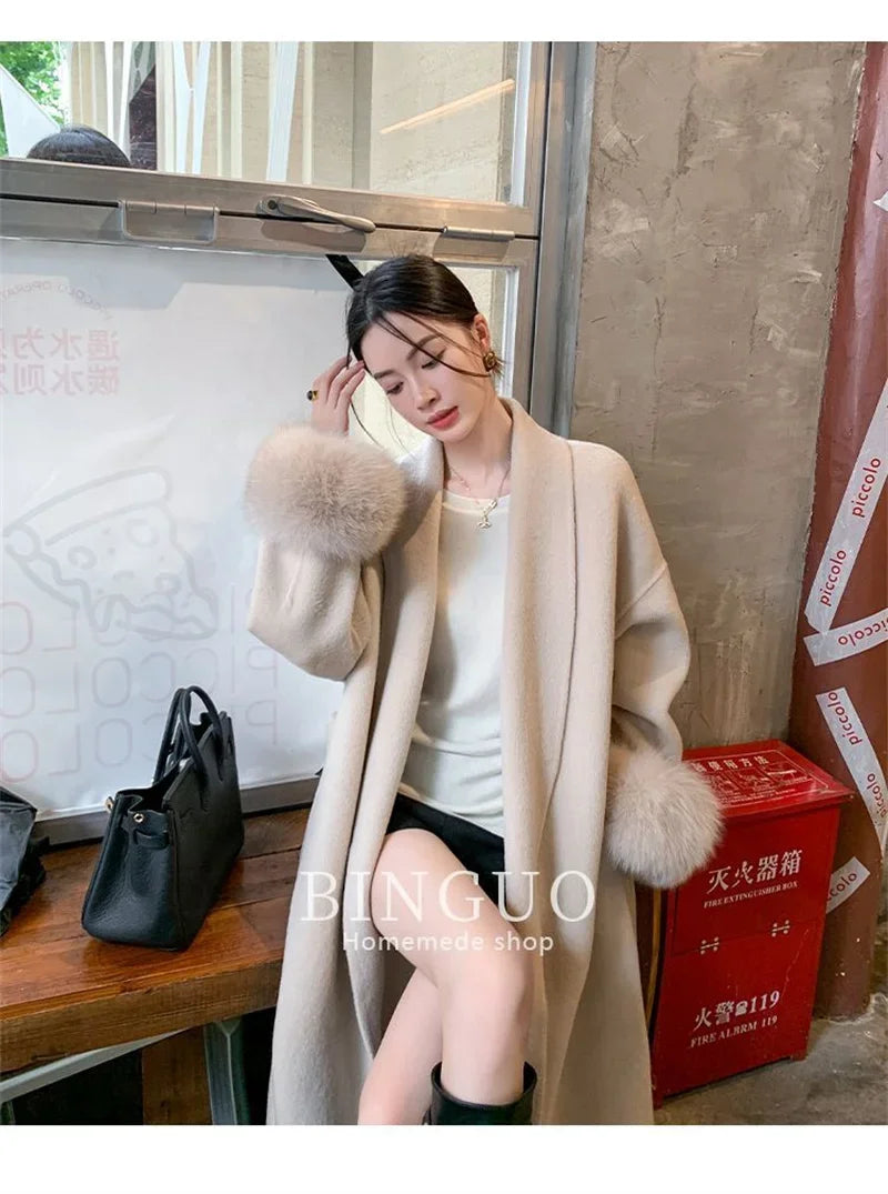 Grauer Wollmantel mit Krawatten-Taillenkollektion für Damen im Herbst und Winter 2024, neuer langärmeliger, lockerer High-End-Cape-Mantel, mittellanges Oberteil