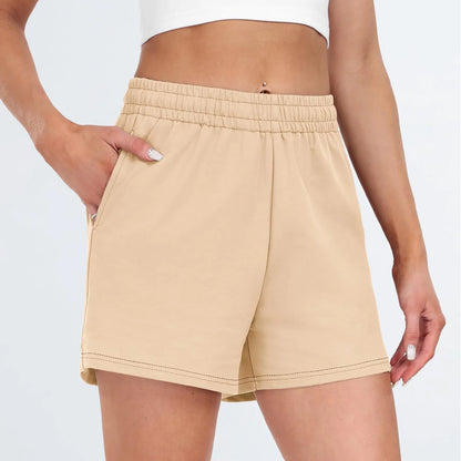 Plain Color Sports Shorts Casual Summer Comfortable And Soft Elastic High Waist Running Shorts With Pockets For Women.