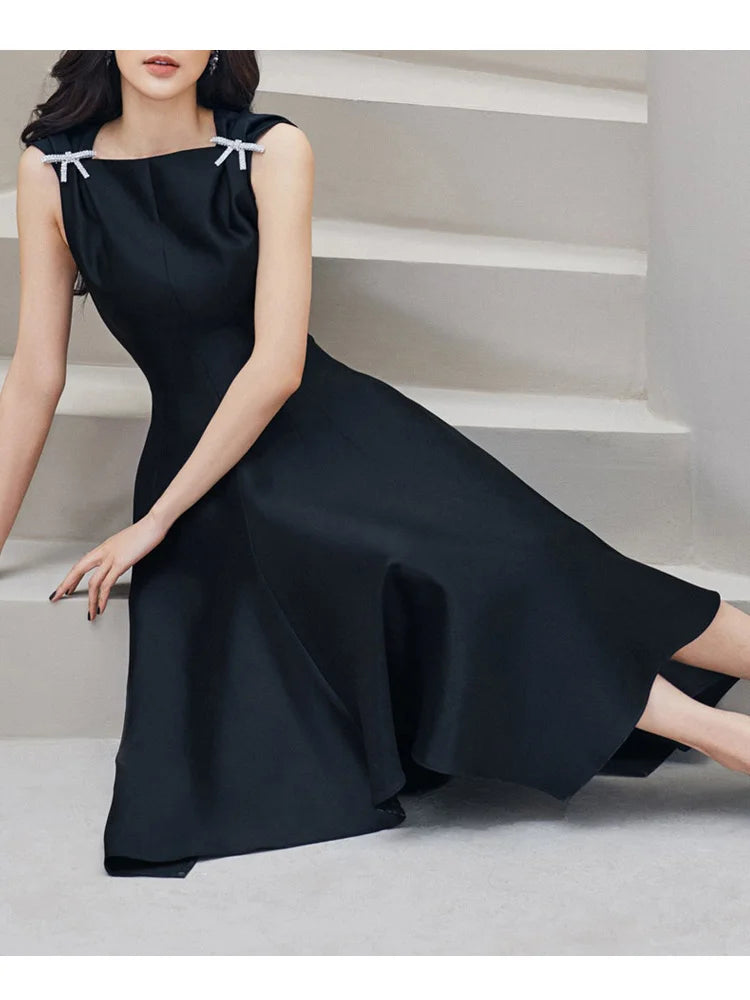 TWOTWINSTYLE Elegante Schwarz Kleid Für Frauen Quadrat Kragen Ärmellose Hohe Taille Solide Patchwork Bowknot Midi Kleider Weiblichen Stil.