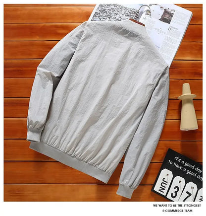 2024 Summer New Thin Style Round Neck Long Sleeve Screw Thread Zipper Jacket Man Solid Color Pockets Casual Sunscreen Clothing.